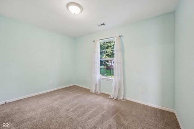 empty room featuring carpet flooring and baseboards | Image 20
