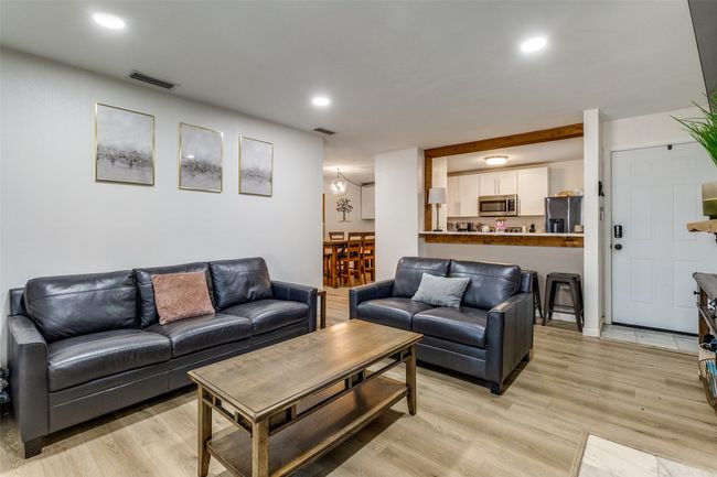Living room featuring recessed lighting, visible vents, and light wood-type flooring | Image 4