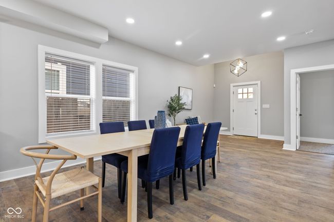dining area with baseboards, wood finished floors, and recessed lighting | Image 13