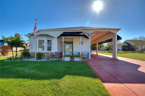 1039 Motorcoach Dr, POLK CITY, FL, 33868-9178 | Card Image