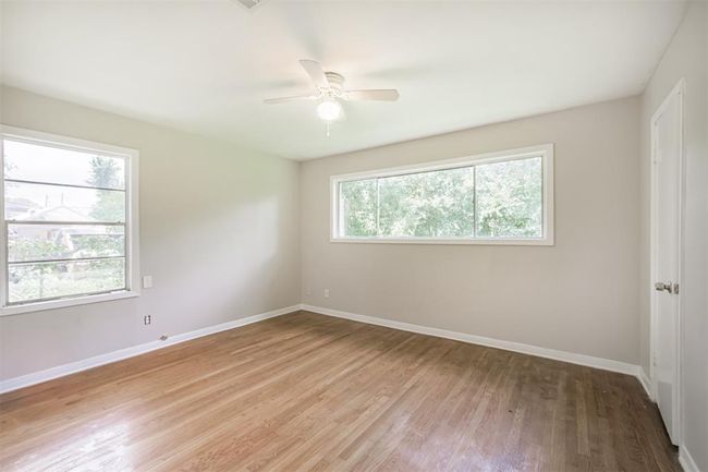 Large Primary bedroom looks out to backyard | Image 8