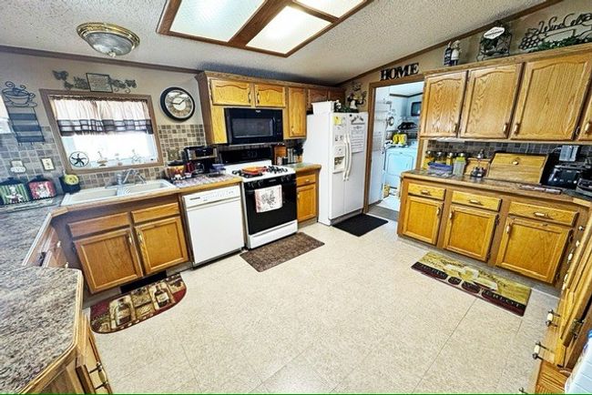 415 Wagner St, House other with 3 bedrooms, 2 bathrooms and 2 parking in Duncombe IA | Image 4