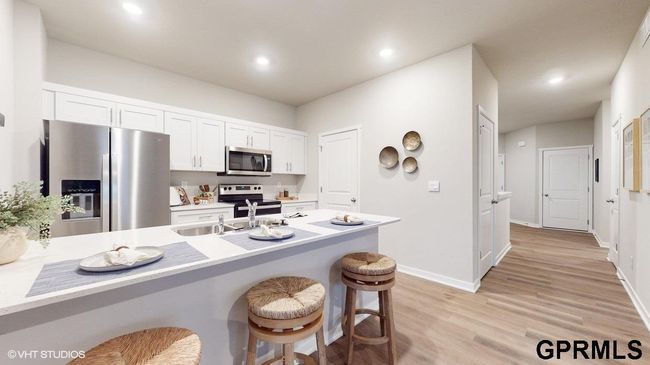 7717 N 170 Th St, Townhouse with 4 bedrooms, 3 bathrooms and 2 parking in Bennington NE | Image 7