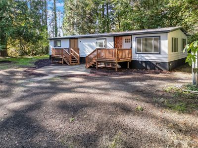 Must see newly updated manufactured home on 1 acre surrounded by nature ready to move in or keep as rental invesment property minutes to Puget sound beaches and water fun | Image 1