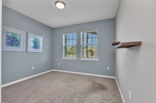 Carpeted spare room featuring baseboards | Image 15