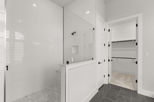 Primary bath featuring an oversized walk in shower | Image 23