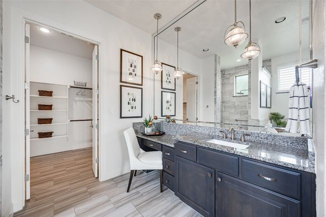 Full bath master featuring vanity, a tile shower, a spacious closet, and recessed lighting | Image 27