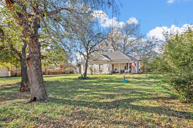 View of yard with a porch | Image 8