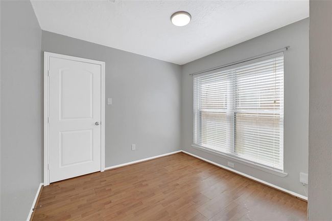 Cozy nook ideal for reading or a compact workspace. | Image 18