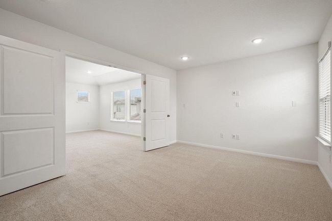 Empty room featuring light carpet and recessed lighting | Image 16