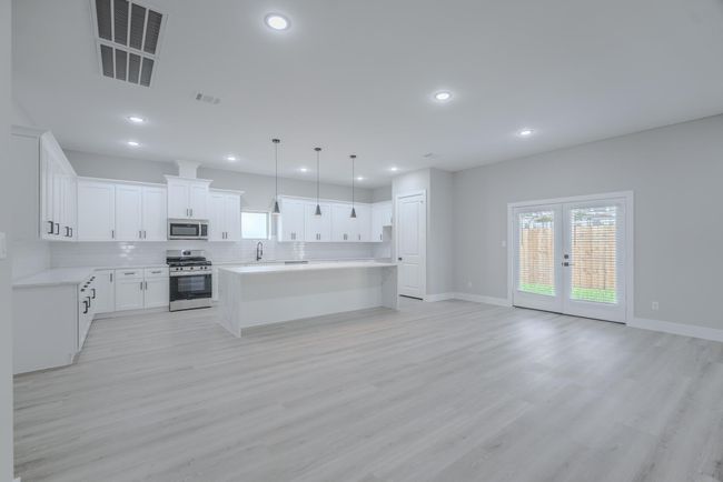 Dining room sits conveniently off the kitchen for seamless flow | Image 11