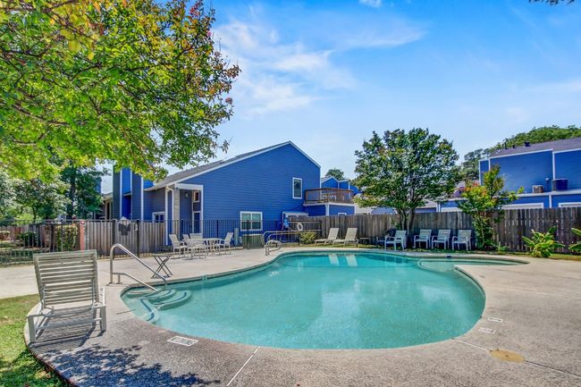 Community pool with a patio area | Image 21