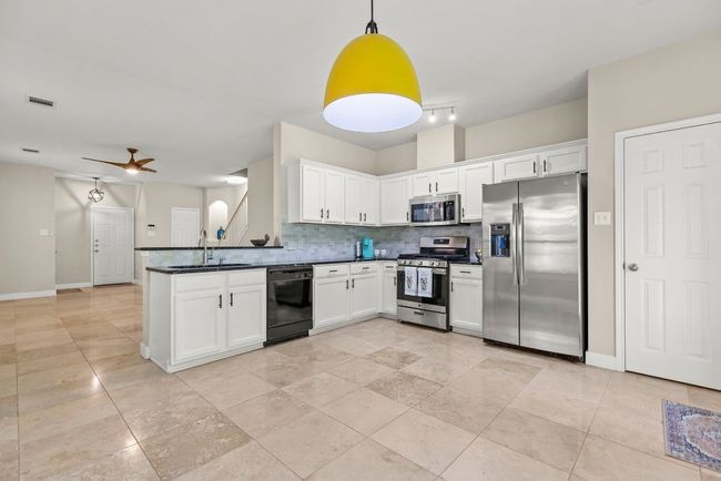 Spacious Dining Area inside Kitchen beside Patio Door! | Image 10