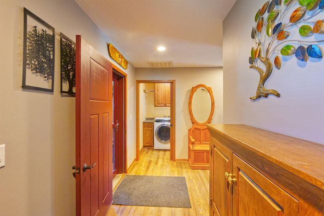 Entrance facing garage entrance and laundry room | Image 5