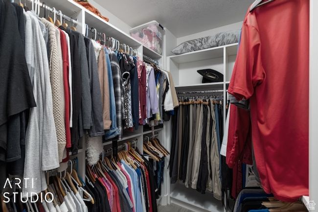 View of walk in closet | Image 35