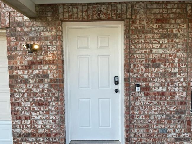 Doorway to property with brick siding | Image 20