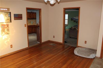 Empty room with dark hardwood / wood-style flooring | Image 3