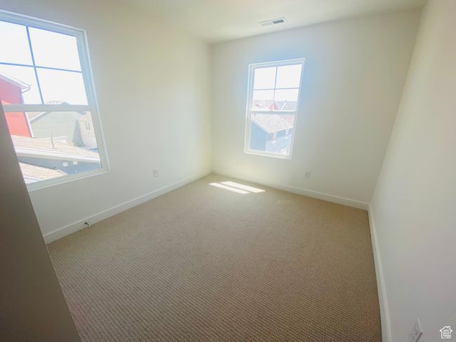 Carpeted empty room with baseboards | Image 19