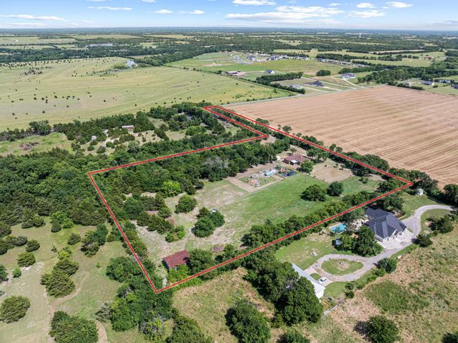 Overview of rural landscape featuring property parcel outlined | Image 11