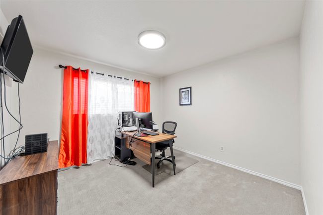 Carpeted office space with baseboards | Image 32