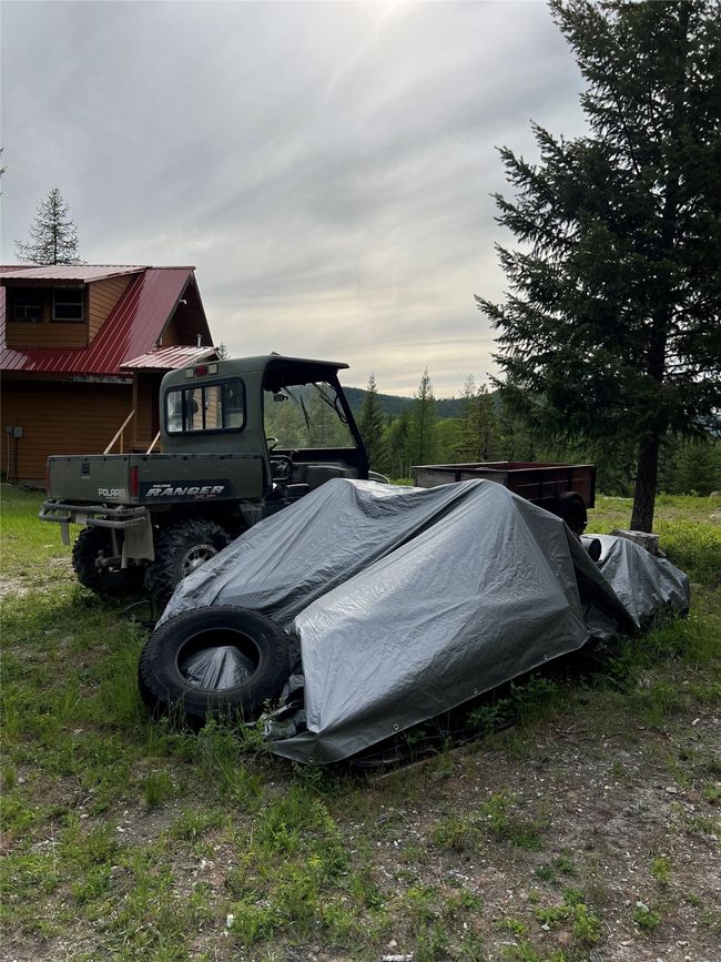 Polaris, snowmobiles, and utility trailer | Image 67