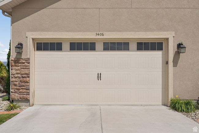 Garage featuring driveway | Image 39