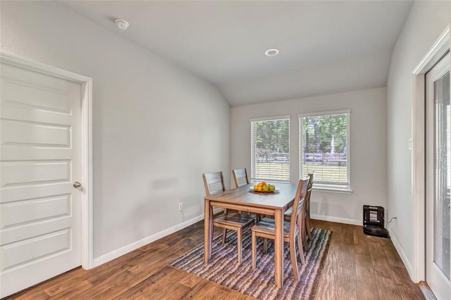 Primary bedroom to the left, access to the porch on the right. View of White's Park from dining room | Image 26