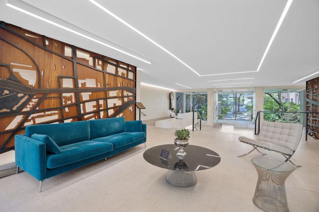 Common area with floor to ceiling windows | Image 13
