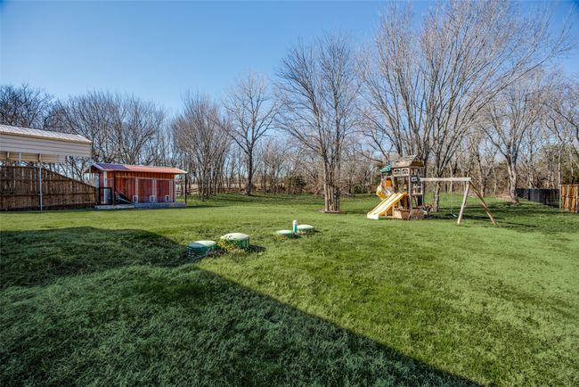 View of yard featuring a playground | Image 24