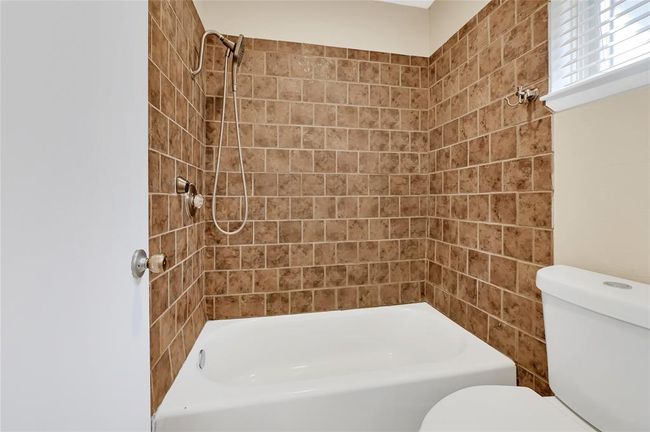 Luxurious private shower in the primary suite. | Image 23