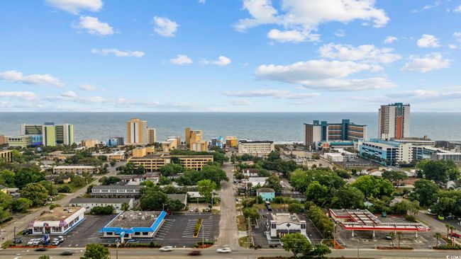 View of urban area with a large body of water | Image 20