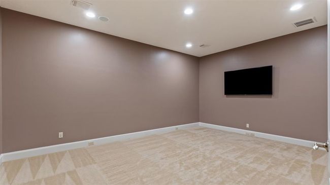 The Media Room upstairs is ready for you family to enjoy a Saturday night movie or the Sunday Game. | Image 36