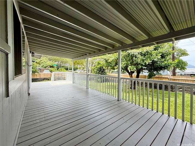 covered porch, puakenikeni tree | Image 14