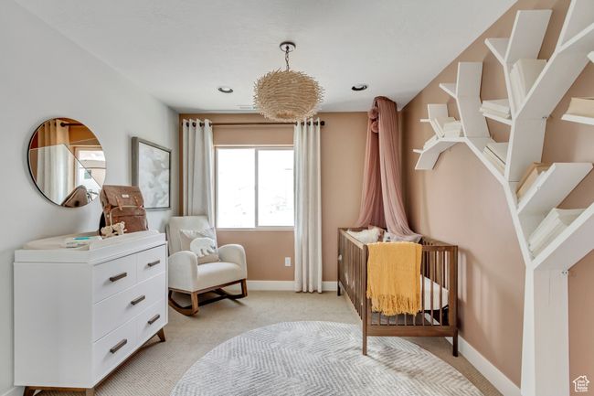 Sitting room with light carpet and baseboards | Image 19