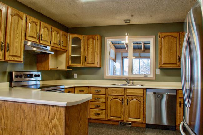 9502 123 Avenue, Home with 4 bedrooms, 2 bathrooms and 4 parking in Grande Prairie AB | Image 6