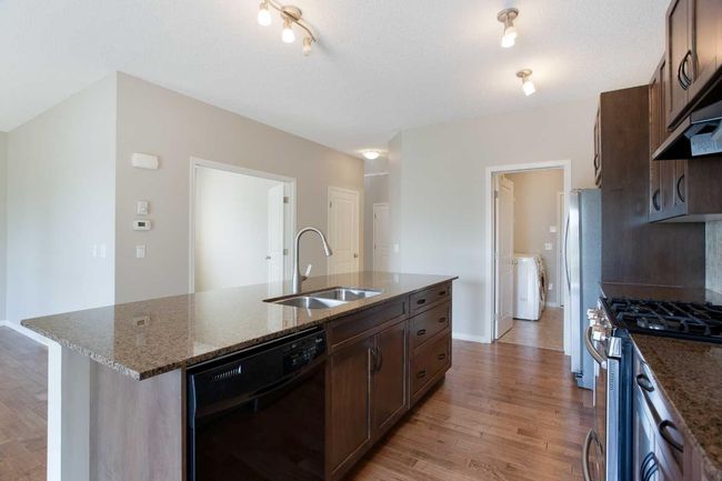 32 Drake Landing Hill, House other with 3 bedrooms, 3 bathrooms and 4 parking in Okotoks AB | Image 6