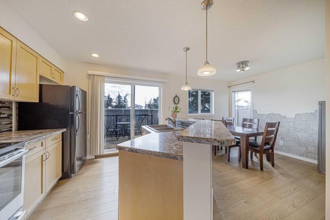 50 Panatella Park Nw, Home with 4 bedrooms, 2 bathrooms and 2 parking in Calgary AB | Image 5