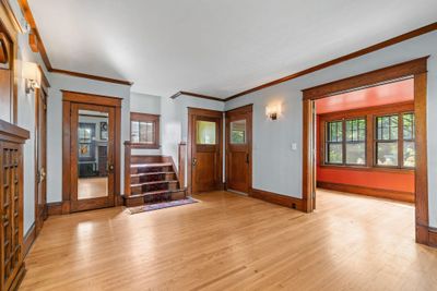 Doors, from L to R: closet, 1/2 bath, entrance, sunroom (French). | Image 3