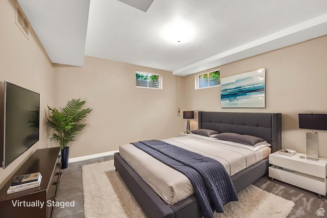 Carpeted bedroom featuring baseboards | Image 20
