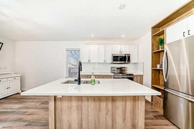 207 Coachway Rd Sw, House other with 3 bedrooms, 3 bathrooms and 2 parking in Calgary AB | Image 10