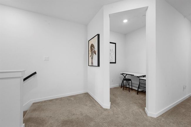 Corridor featuring light carpet | Image 20