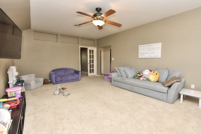 This space offers multiple uses for any busy family...note the french doors that allow for privacy in this space. | Image 26