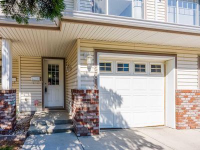 28 Country Hills Cove Nw, Home with 3 bedrooms, 1 bathrooms and 2 parking in Calgary AB | Image 2