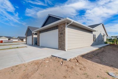 View of property exterior featuring a garage | Image 1