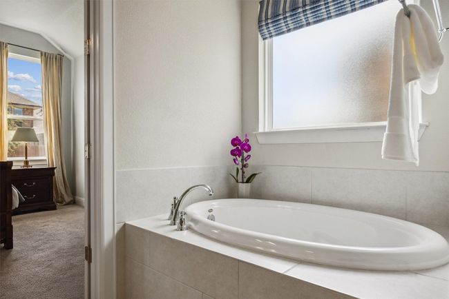 Full bath featuring a bath | Image 22