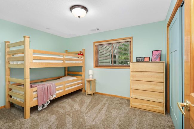 The spacious 4th bedroom located in the Lower Level. | Image 25