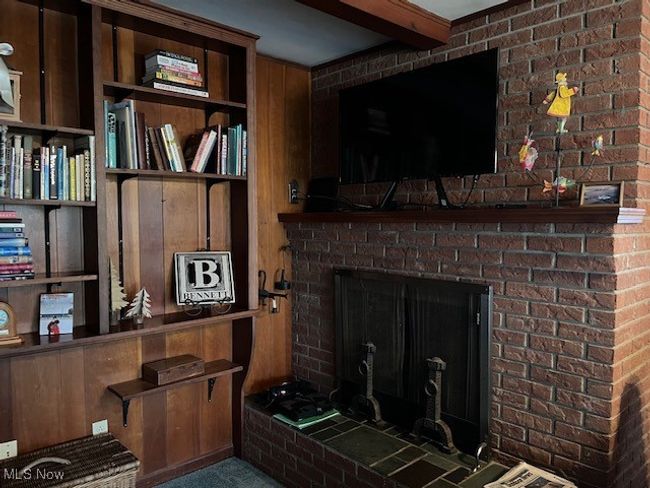 View of interior family room with gas fireplace | Image 8