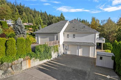 Two double car garages. One for each level of the home. | Image 3