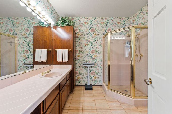 3/4 bathroom w/ tiled step-in shower & tile countertops | Image 27