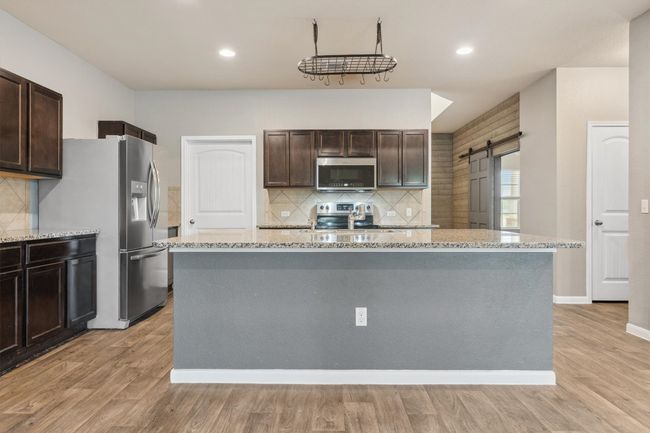 1008 Comal Run, House other with 4 bedrooms, 3 bathrooms and 4 parking in Hutto TX | Image 8